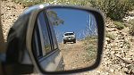 30-Admiring the reflections of the bush on Mt Pinnibar Track